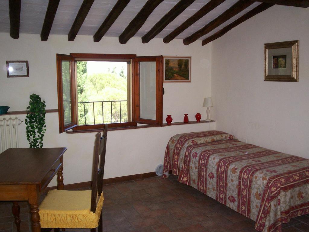 Podere Il Caggio Rooms Сан-Джиминьяно Номер фото